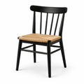 Chaise en bois noir avec siège en rotin